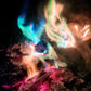 Close-up of Aurora Inferno campfire flames in blue, green, and purple hues