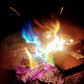 Nighttime campfire demonstration using Aurora Inferno for a magical-campfire-color-changing experience.